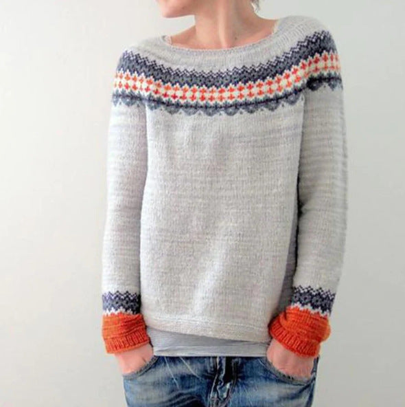 Zemara pullover in grijs met kleurrijke fair isle patronen in oranje, blauw en rood op de schouders en mouwen, voor een stijlvolle en moderne look.