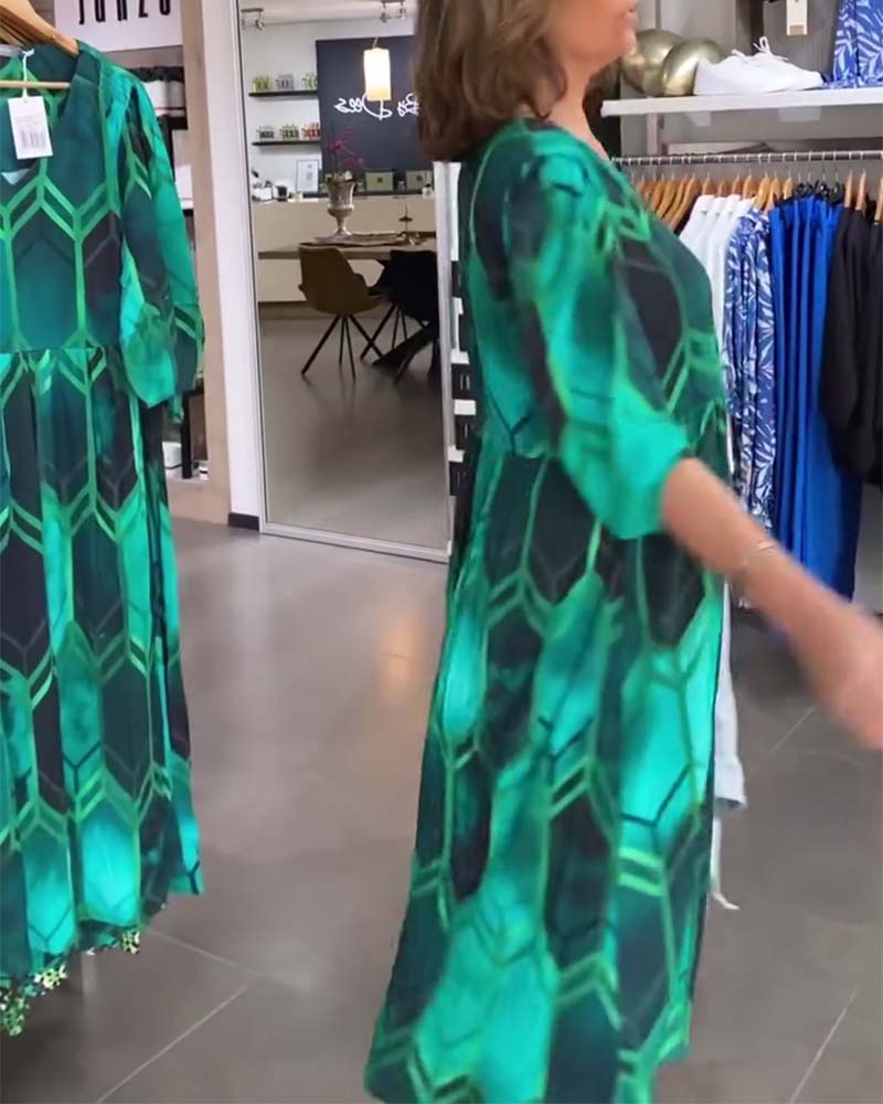 Vrouwelijke Jurk met V-hals en Bloemenprint