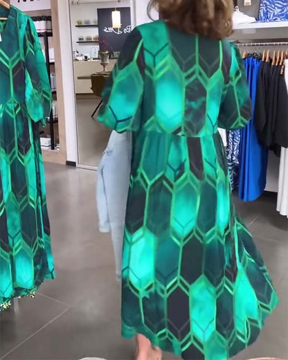 Vrouwelijke Jurk met V-hals en Bloemenprint