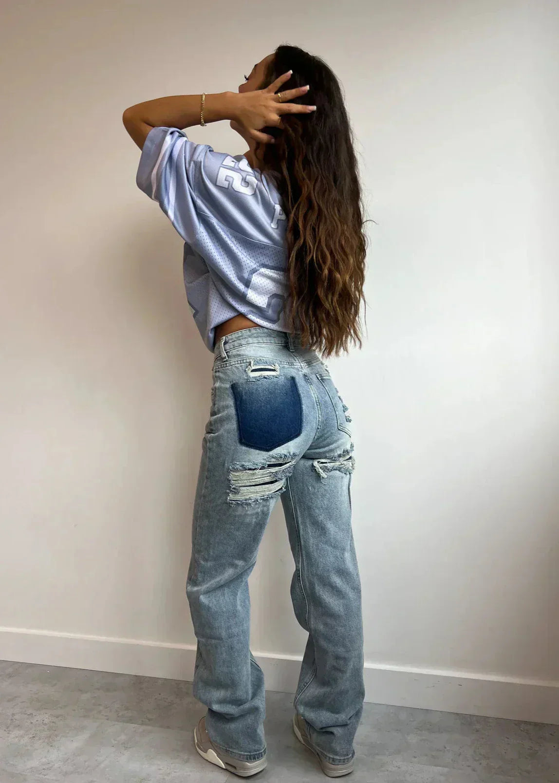 Vintage Ripped Jeans met Uniek Patchwork Detail - StudioMarella