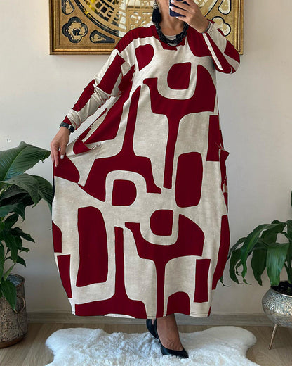 Jurk met lange mouwen en zwart witte print in de kleur Zwart voor dames in stijl ideaal voor de herfst.