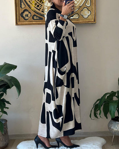 Jurk met lange mouwen en zwart witte print in de kleur Zwart voor dames in stijl ideaal voor de herfst.